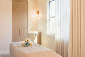 Postel nebo postele na pokoji v ubytování Hotel Viata
