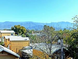 a view of a city with mountains in the background at dado de baja no atendemos no reserven in Mendoza +12 photos