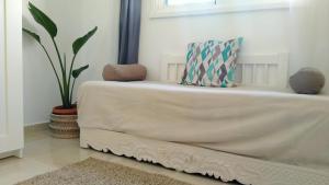 A bed or beds in a room at La casita