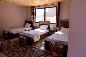 Postelja oz. postelje v sobi nastanitve Bedouin picnic camp