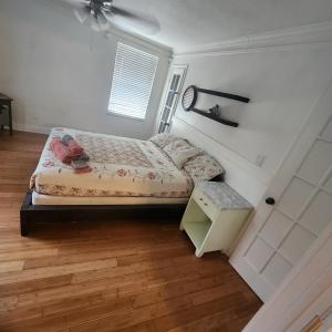 a small bedroom with a bed and a window at Cozy View Downtown Atlanta Condo in Atlanta +10 photos