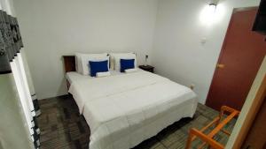 Postelja oz. postelje v sobi nastanitve SRI Home