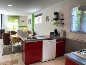 a kitchen with a sink and a counter top at Maison neuve à Jard-sur-Mer, proche plage, forêt, port, 4 pers, WiFi, jardin, plancha - FR-1-336-59 in Jard-sur-Mer