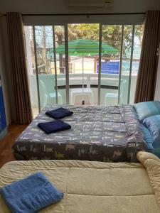Postel nebo postele na pokoji v ubytování Sea View