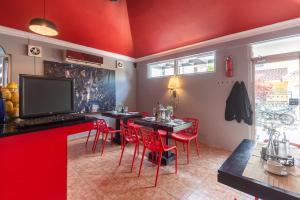 TV a/nebo společenská místnost v ubytování Hotel Casa Jum