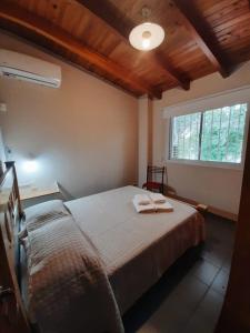 Katil atau katil-katil dalam bilik di Departamento Los Girasoles