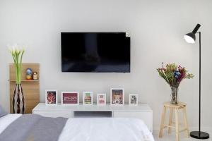 TV a/nebo společenská místnost v ubytování Meteora Pension