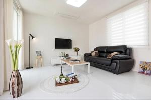 TV a/nebo společenská místnost v ubytování Meteora Pension