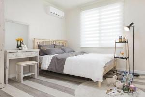 Postel nebo postele na pokoji v ubytování Meteora Pension