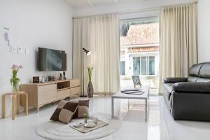TV a/nebo společenská místnost v ubytování Meteora Pension