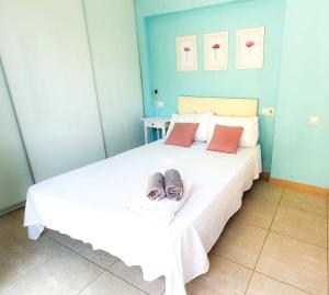 Postel nebo postele na pokoji v ubytování Villa Elisa