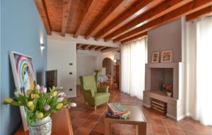 a living room with a couch and a table at Lovely Home In Pieve Di Soligo With Wifi in Pieve di Soligo