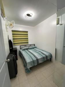 מיטה או מיטות בחדר ב-Feel at Home at Capas 2BR 2BA House
