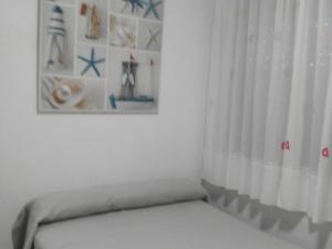Postel nebo postele na pokoji v ubytování Villa de Vacaciones en Costa Dorada, L'Ametlla de Mar, Piscina Privada y Cerca de la Playa - ES-221-11