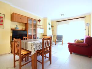 a kitchen and living room with a table and chairs at Casa Palau Sabardera, 3 dormitorios, 6 personas - ES-228-139 in Palau-Saverdera