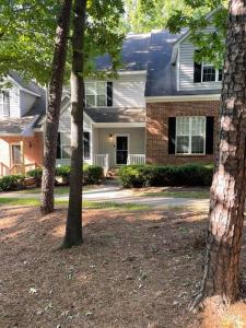a house with three trees in front of it at Full house charm mins frm DT Raleigh, NC State University in Raleigh