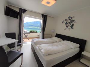 Postel nebo postele na pokoji v ubytování Haus am See