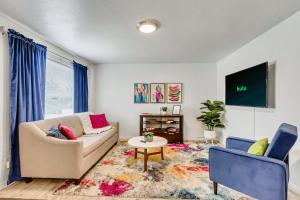 a living room with a couch and two chairs at King bed - Fast Wi-Fi - Walker's Paradise in Salt Lake City