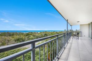 a balcony with a view of the ocean at Eagles Retreat Peregian Beach in Peregian Beach