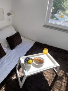 Postel nebo postele na pokoji v ubytování Mobile home Fran