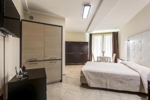 Hotel-Residence-b&b Le Dune beach service included客房内的一张或多张床位
