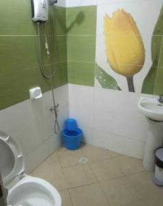 a bathroom with a shower and a toilet at La Romana Countryside Haven in Anao