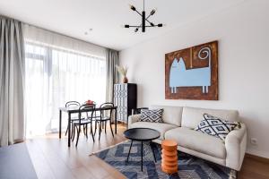 Posezení v ubytování Cosy Home Paupys