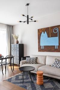 Posezení v ubytování Cosy Home Paupys
