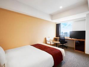 TV a/nebo společenská místnost v ubytování Daiwa Roynet Hotel Nagoya Shinkansenguchi