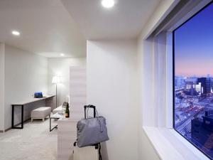 TV a/nebo společenská místnost v ubytování Daiwa Roynet Hotel Nagoya Shinkansenguchi