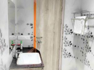 A kitchen or kitchenette at RBS Hotel & Restaurant 5 mint walking distance from Ram Janam Bhumi