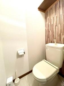 a bathroom with a white toilet in a room at Avidasion - Vacation STAY 13342 in Biei