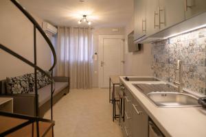 Køkken eller tekøkken på Amaryllis Maison Emporiou + 36 billeder