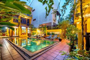 Bazén v ubytování Hoi An Green Riverside Oasis Villa nebo v jeho okolí