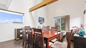 a dining room with a table and chairs at Krystal Peaks in Dinner Plain