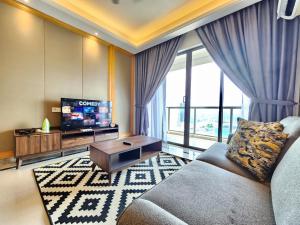 Televisyen dan/atau pusat hiburan di R&F Princess Cove CIQ Premium Sea View Suites by NEO