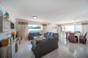 A seating area at Villa Volcan by Villa Plus