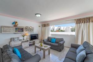 A seating area at Villa Volcan by Villa Plus
