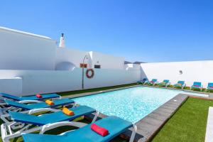 The swimming pool at or close to Villa Volcan by Villa Plus
