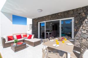A seating area at Villa Volcan by Villa Plus