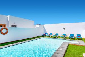 The swimming pool at or close to Villa Volcan by Villa Plus