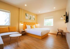 Katil atau katil-katil dalam bilik di Bloom Hotel Koramangala