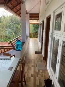 Balkón nebo terasa v ubytování Shilpa Vikas Homestay