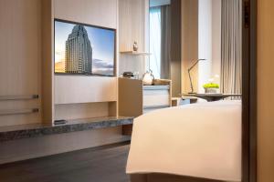 Postel nebo postele na pokoji v ubytování JW Marriott Hotel Xi'an