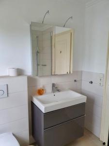 Kúpeľňa v ubytovaní Friesenhaus-Maren-Sterntaucher
