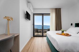 Ένα ή περισσότερα κρεβάτια σε δωμάτιο στο NEW! Villa Una with heated pool, 1km from the beach +55 φωτογραφίες