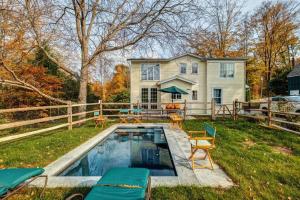 a backyard with a pool and a house at Tophet Road, 3-BR with Spa Plunge Pool - PoshPadsCT in Roxbury
