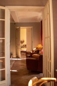 a living room with two chairs and a couch at La Belle Eco in Montréal