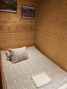 Postel nebo postele na pokoji v ubytování Apartamenty i Domki Biały Dunajec