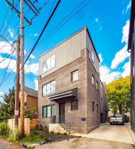 a brick building on a street at Historic German Village Industrial Masterpiece in Columbus